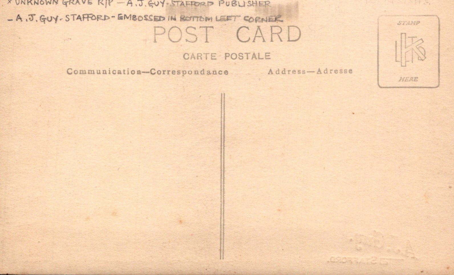 Back of a vintage postcard with text and a stamp