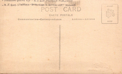 Back of a vintage postcard with text and a stamp