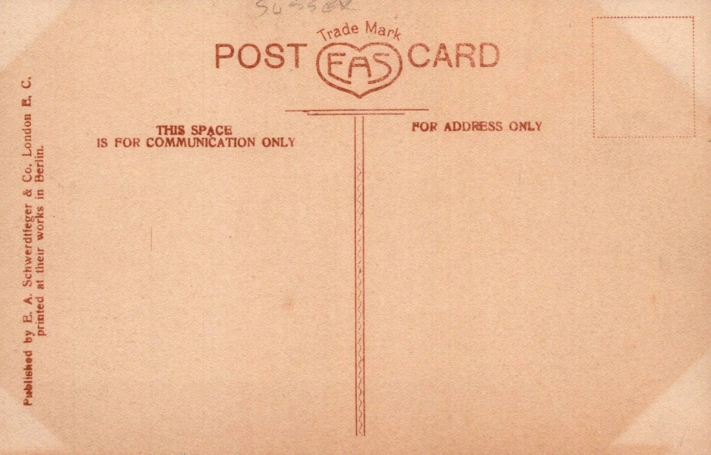 Back of a vintage postcard with text and a heart logo.