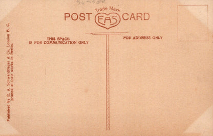 Back of a vintage postcard with text and a heart logo.