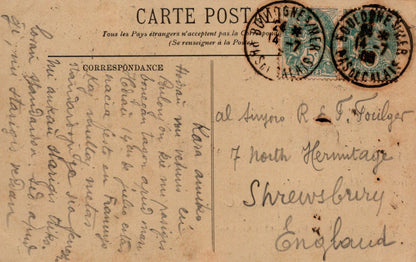 Vintage postcard with stamps and handwritten text, likely from the early 20th century.