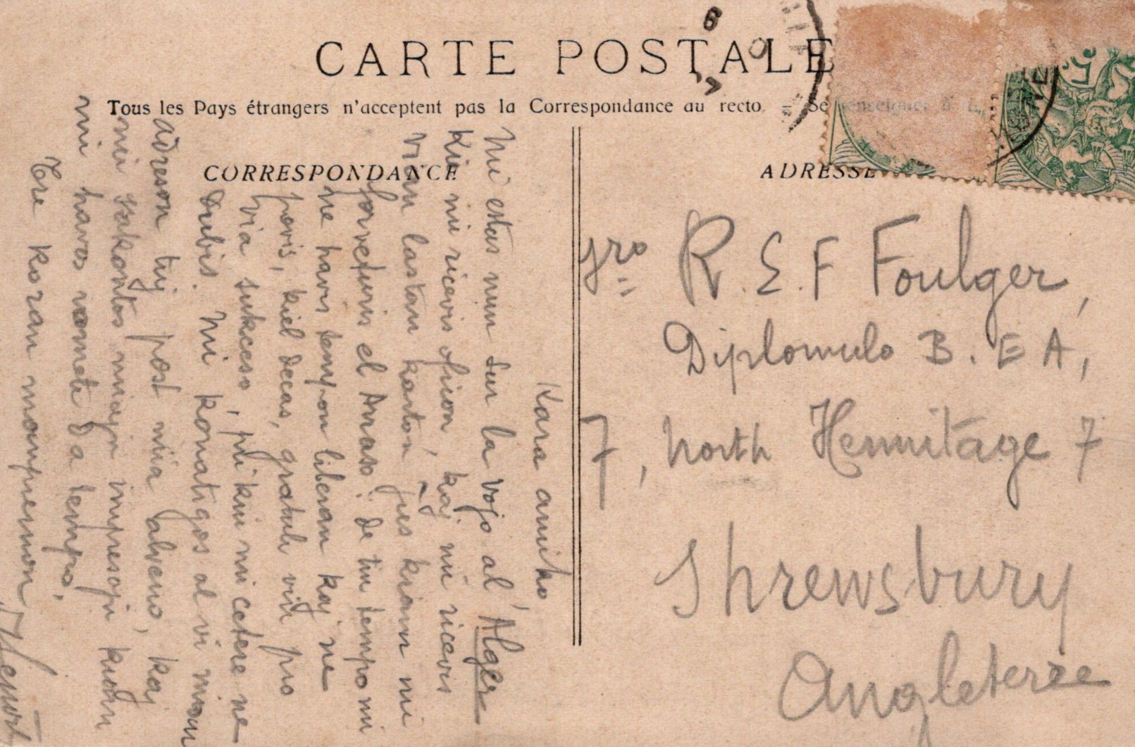 Vintage postcard with text and stamps, featuring a handwritten address.
