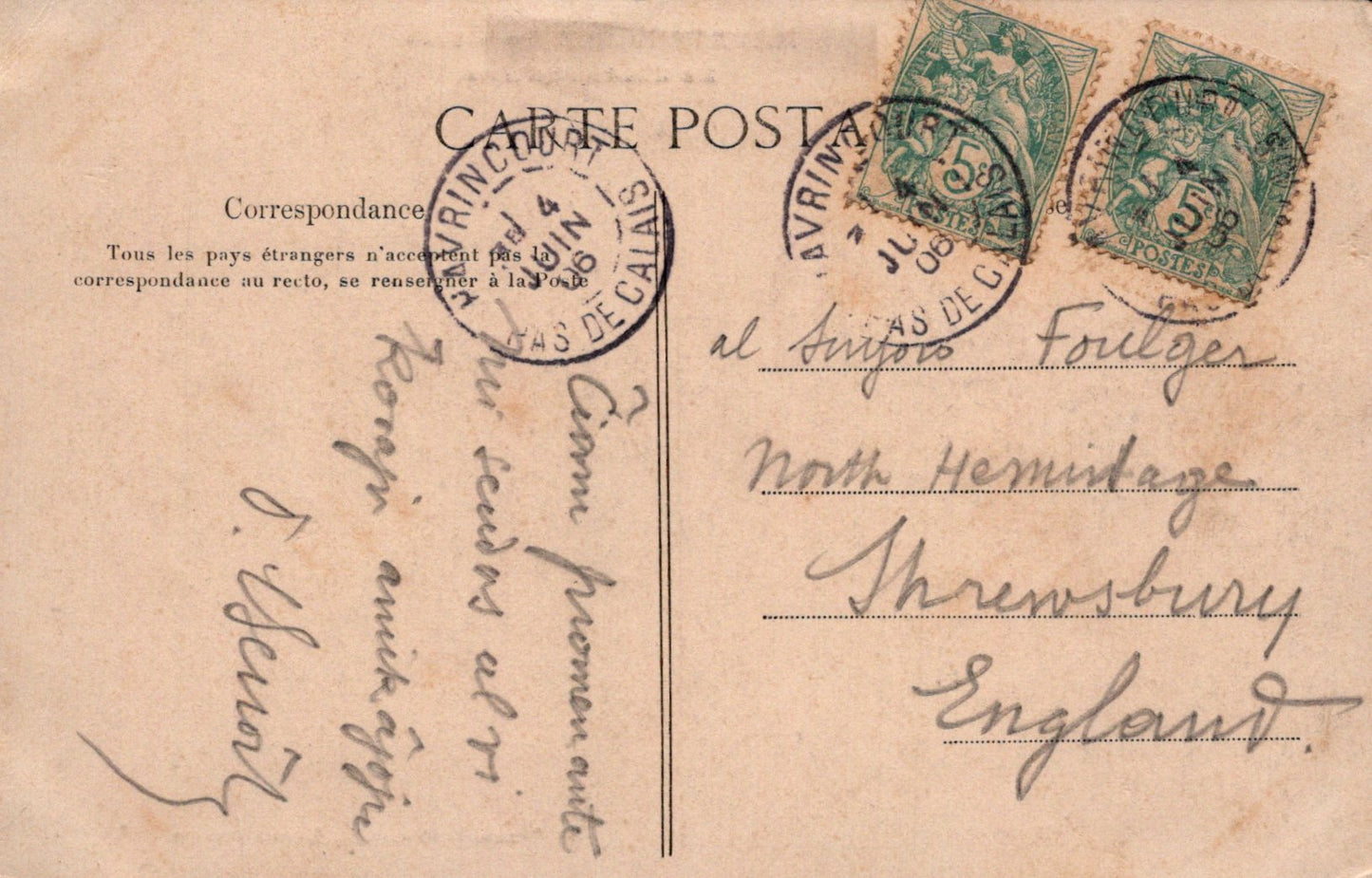 Vintage postcard with stamps and cursive writing on a beige background