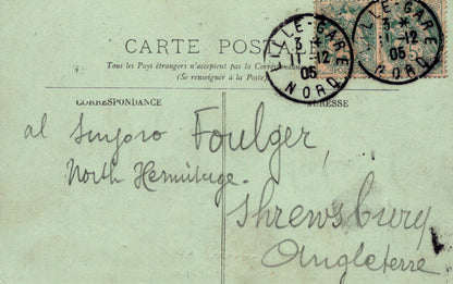Vintage postcard with stamps and handwritten text on a light green background