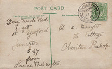 Load image into Gallery viewer, Vintage postcard with handwritten text and a stamp, featuring a green and black design.
