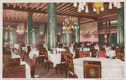 Vintage interior of a grand dining room with tables, chairs, and chandeliers.