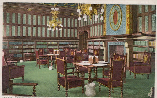 Vintage-style interior of a library with wooden tables and chairs, bookshelves, and decorative elements.