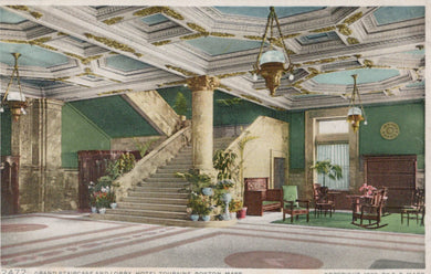 Decorative interior of a hotel lobby with staircase and elegant decor
