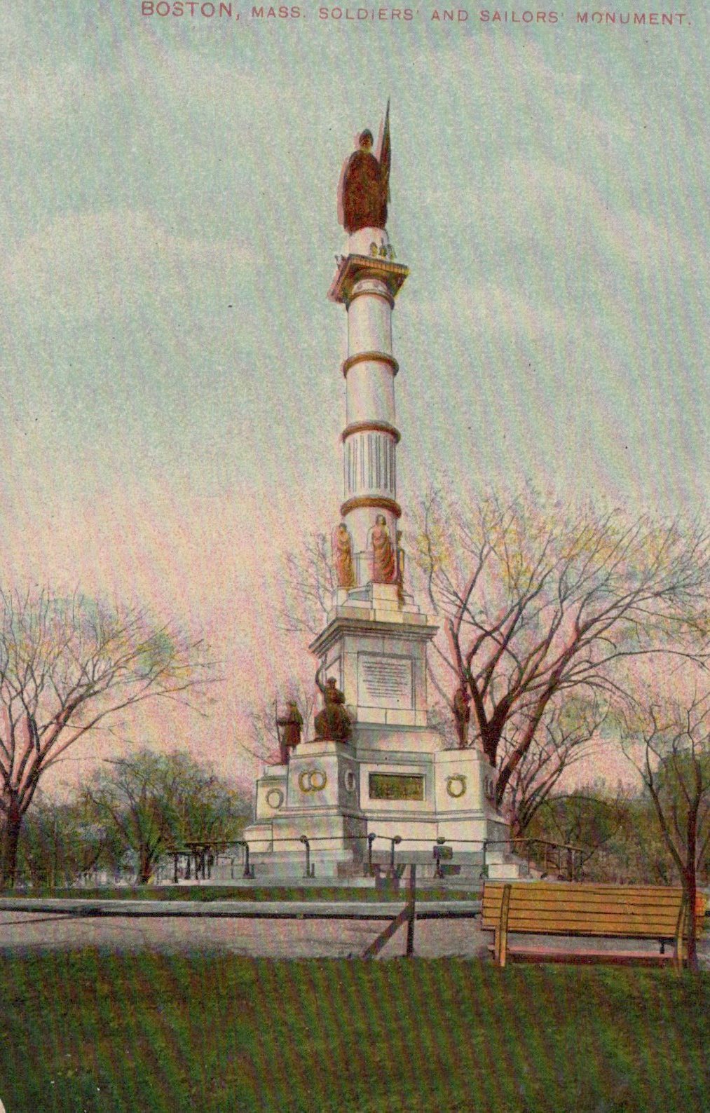 Soldiers and Sailors Monument in Boston, Massachusetts, with trees and a bench in the foreground.