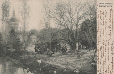 Vintage black and white photograph of a park with trees, benches, and people in Buenos Aires.