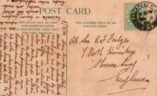 Load image into Gallery viewer, Vintage postcard with text and postage stamp, featuring a brown background.
