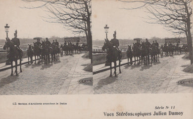 Stereoscopic image of a military procession with horses and soldiers on a street.