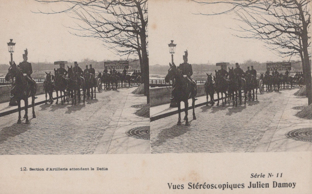 Stereoscopic image of a military procession with horses and soldiers on a street.