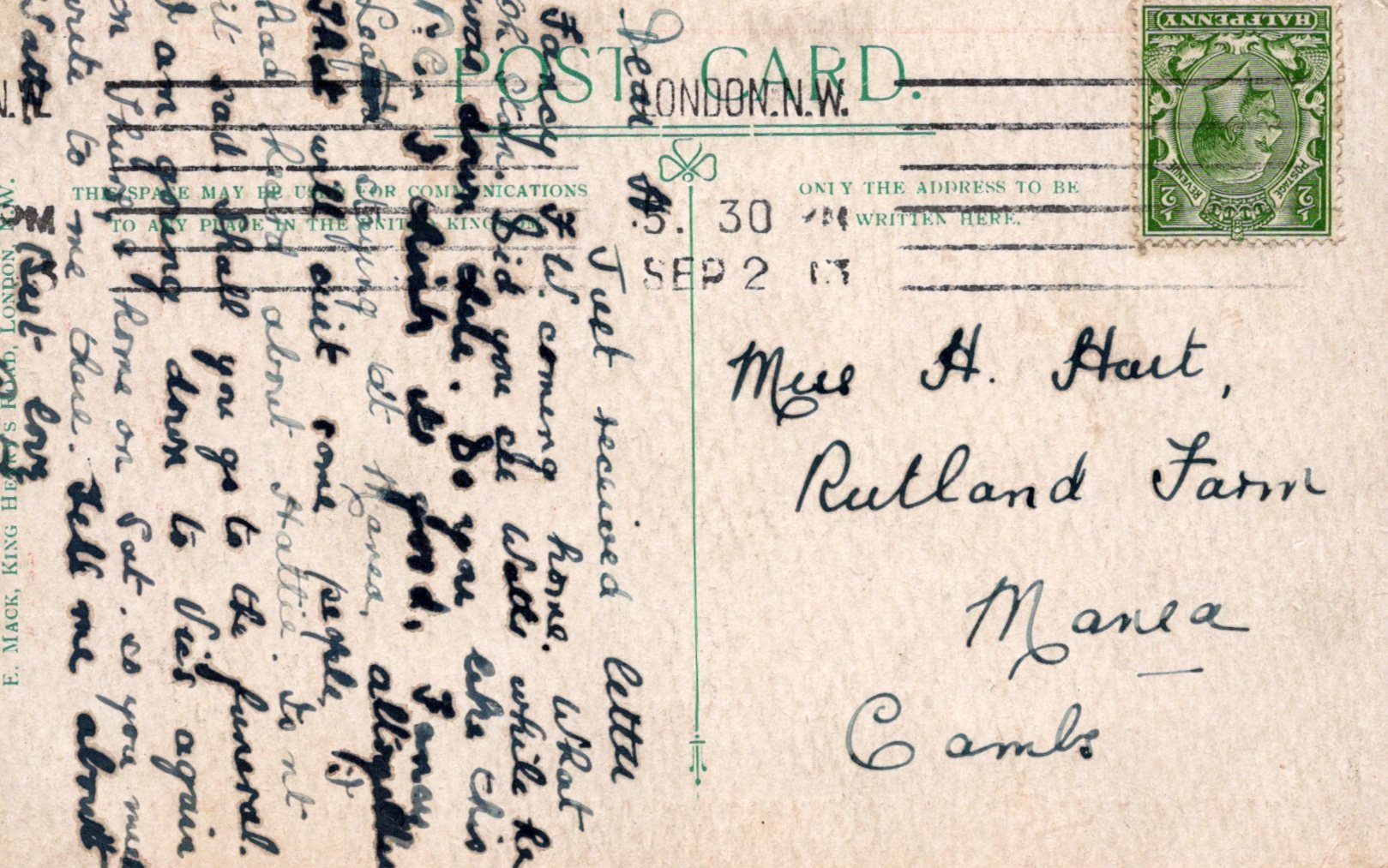 Vintage postcard with text and a stamp on a textured background