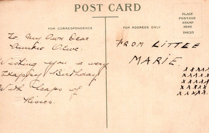 Vintage postcard with handwritten text and a vertical line.