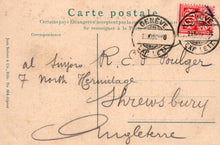 Load image into Gallery viewer, Vintage postcard with stamps and cursive writing, featuring airmail label.
