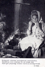 Load image into Gallery viewer, Children Postcard - Skolt Girl Preparing Reindeer Sinews SW18222
