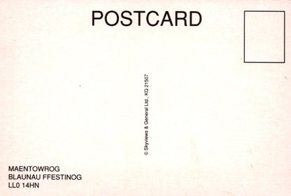 Back of a postcard with text and a small square for a message.