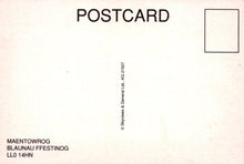 Load image into Gallery viewer, Back of a postcard with text and a small square for a message.
