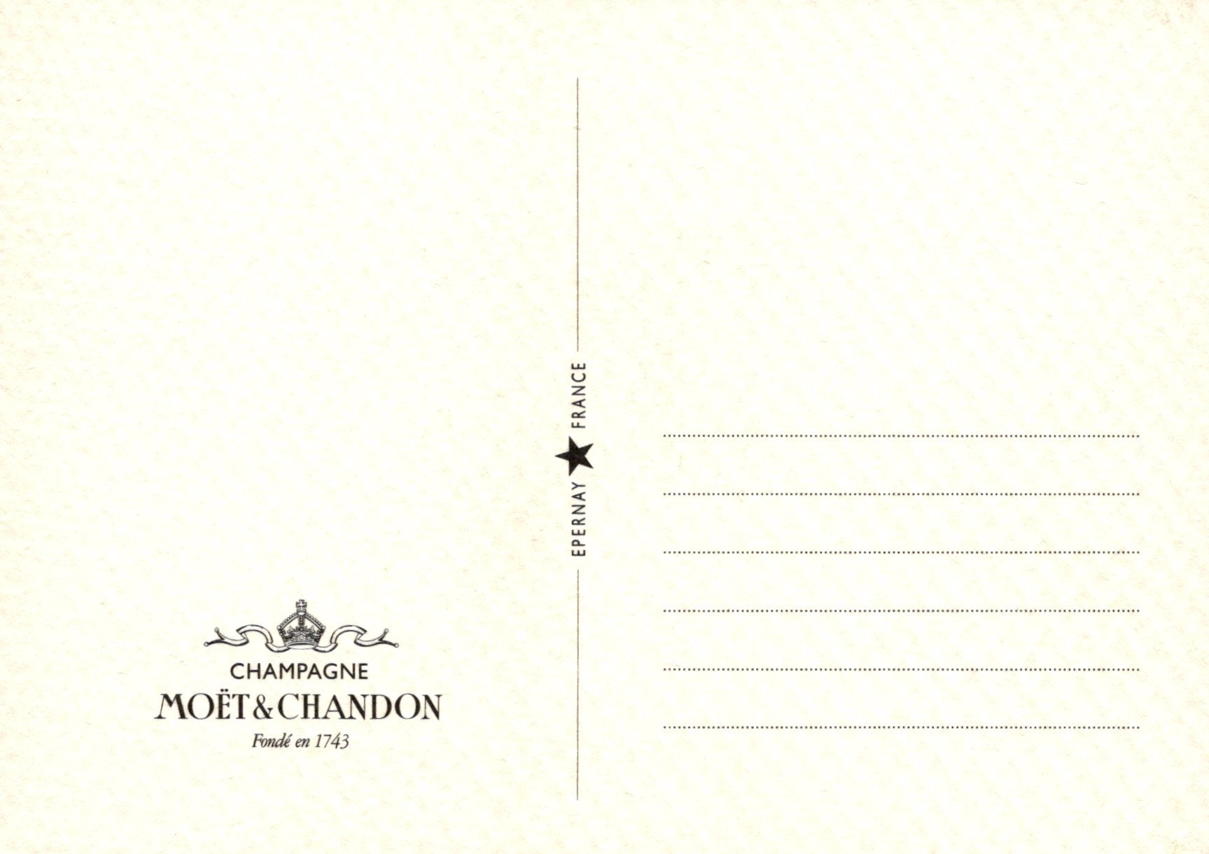 Moét é Chandon champagne bottle label on a beige background