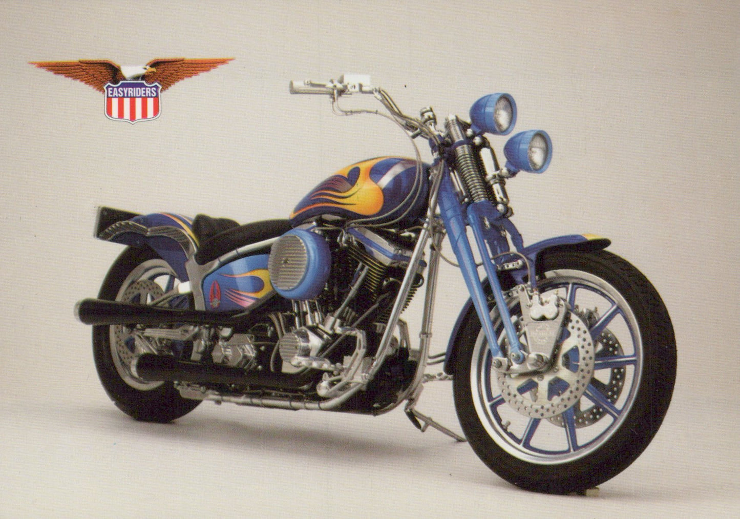 Motorcycle with flame design on a white background, featuring Eastwood logo.
