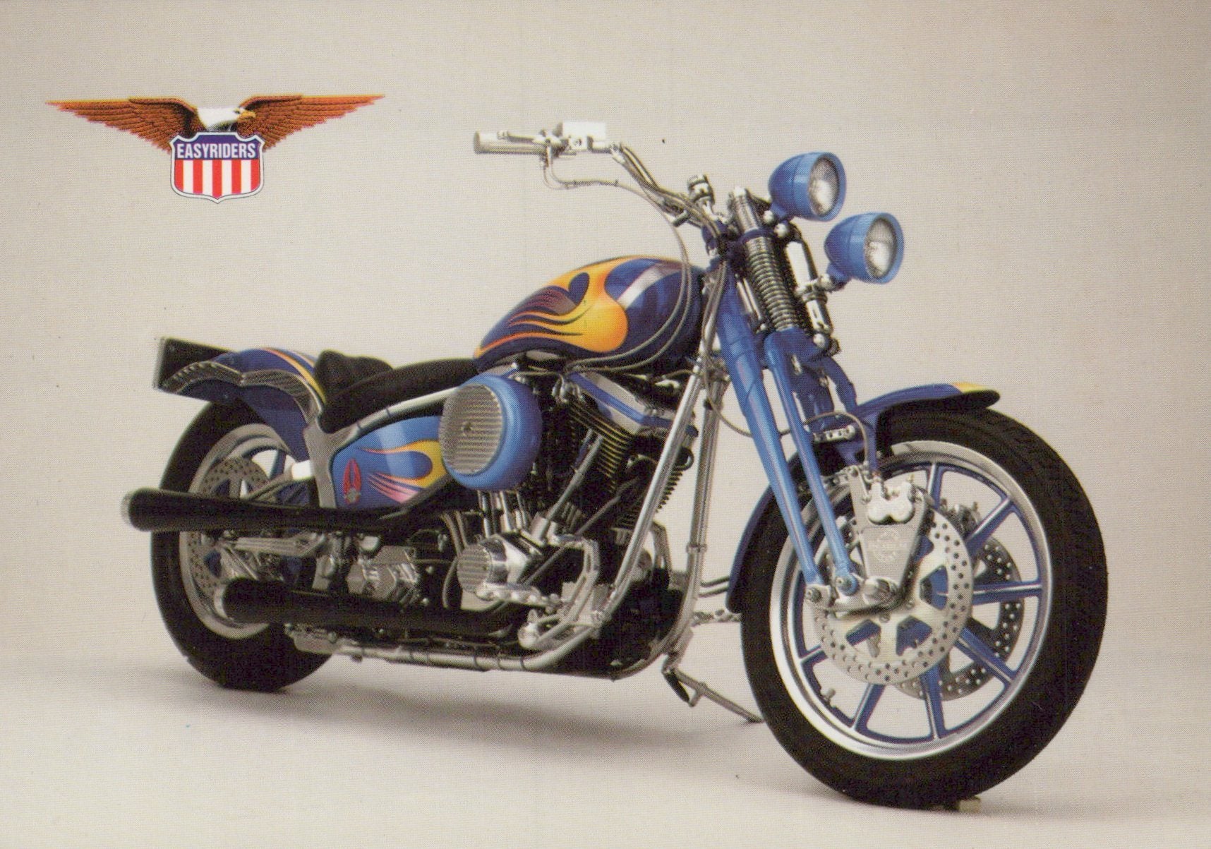 Motorcycle with flame design on a white background, featuring Eastwood logo.