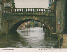 Load image into Gallery viewer, Bridge over a canal with buildings on either side, featuring a watermill.
