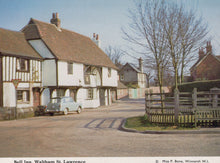 Load image into Gallery viewer, Vintage photograph of a street scene with a half-timbered building and a car parked on the side.
