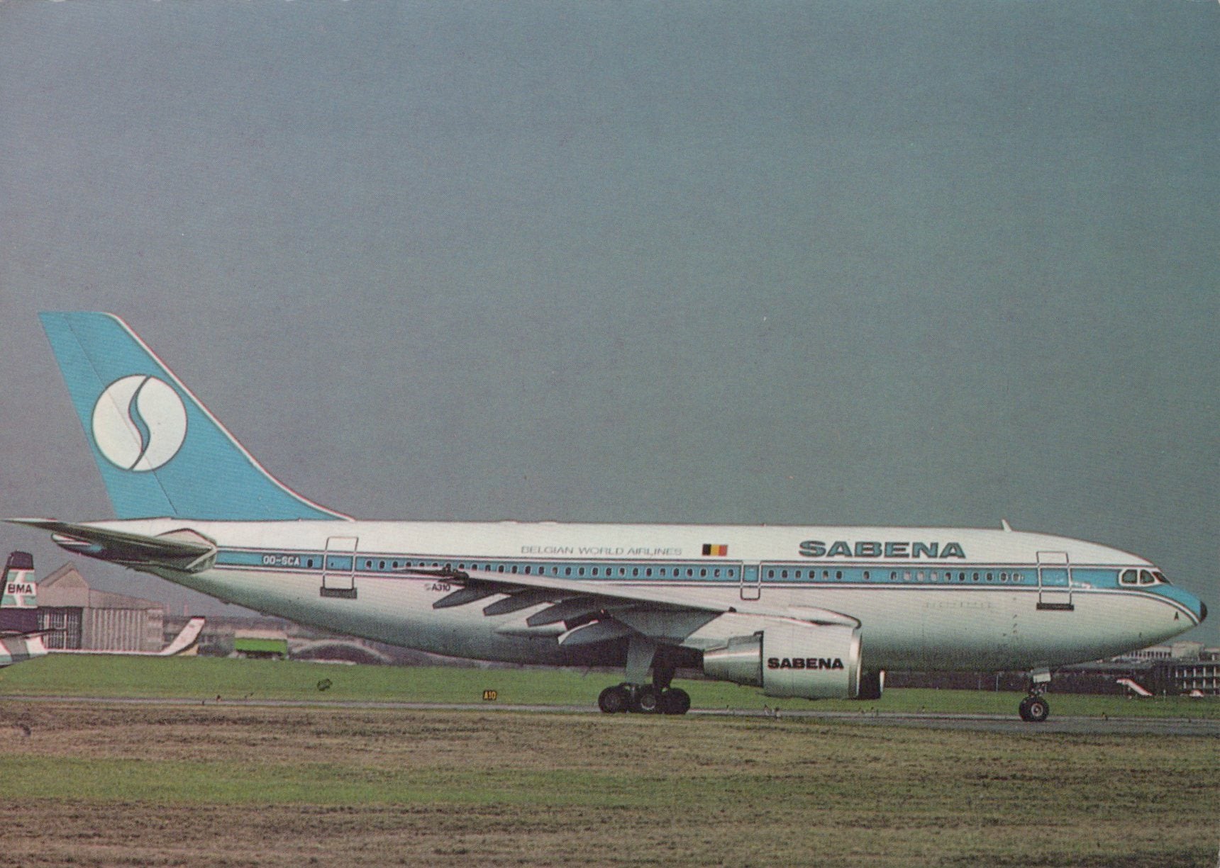 Sabena airplane on a runway with a clear sky background