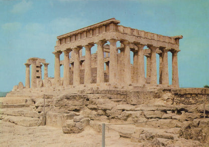 Ancient temple with columns against a blue sky