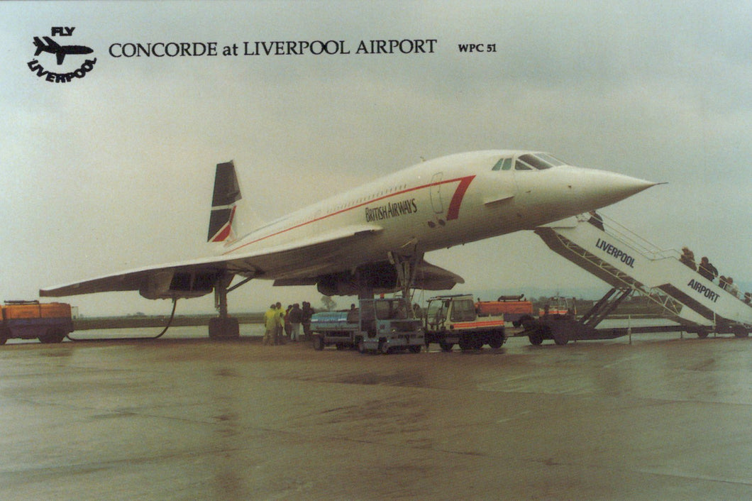 Concorde airplane at Liverpool Airport with visible branding and airport infrastructure.