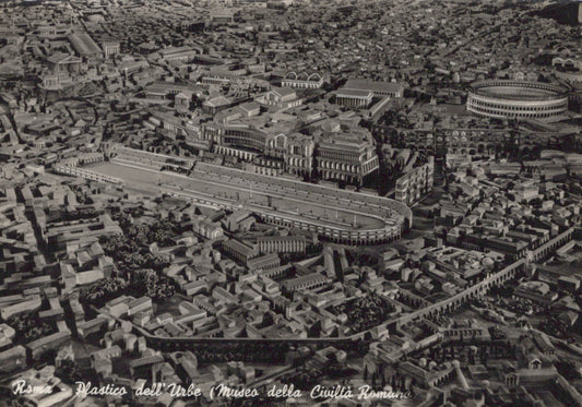 Aerial view of ancient Roman city with Colosseum and other landmarks