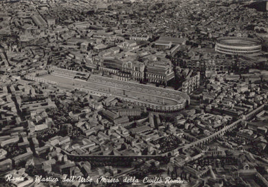 Aerial view of ancient Roman city with Colosseum and other landmarks