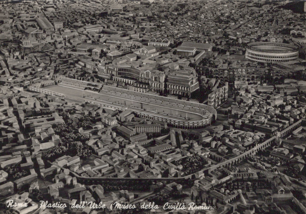 Aerial view of ancient Roman city with Colosseum and other landmarks