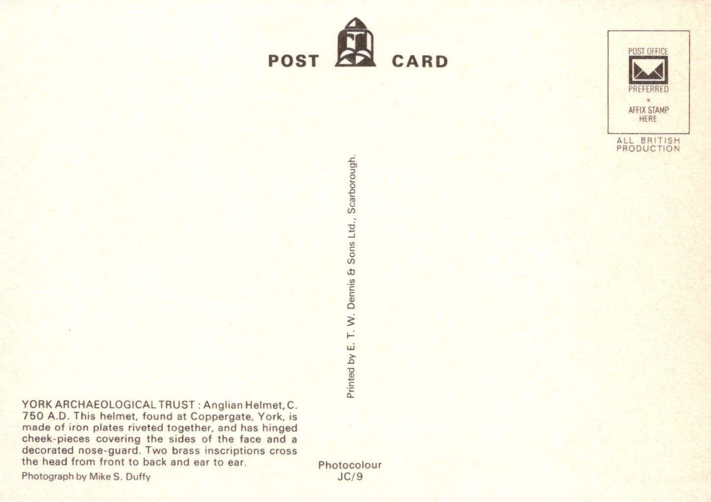 Back of a postcard with text and a logo, featuring a gradient background.