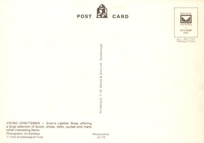 Back of a postcard with text and a logo on a beige background