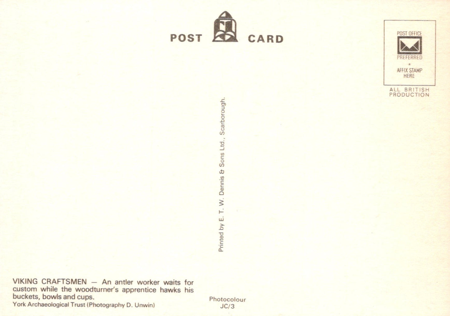 Back of a postcard with text and a logo on a beige background