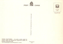 Load image into Gallery viewer, Back of a postcard with text and a logo on a beige background
