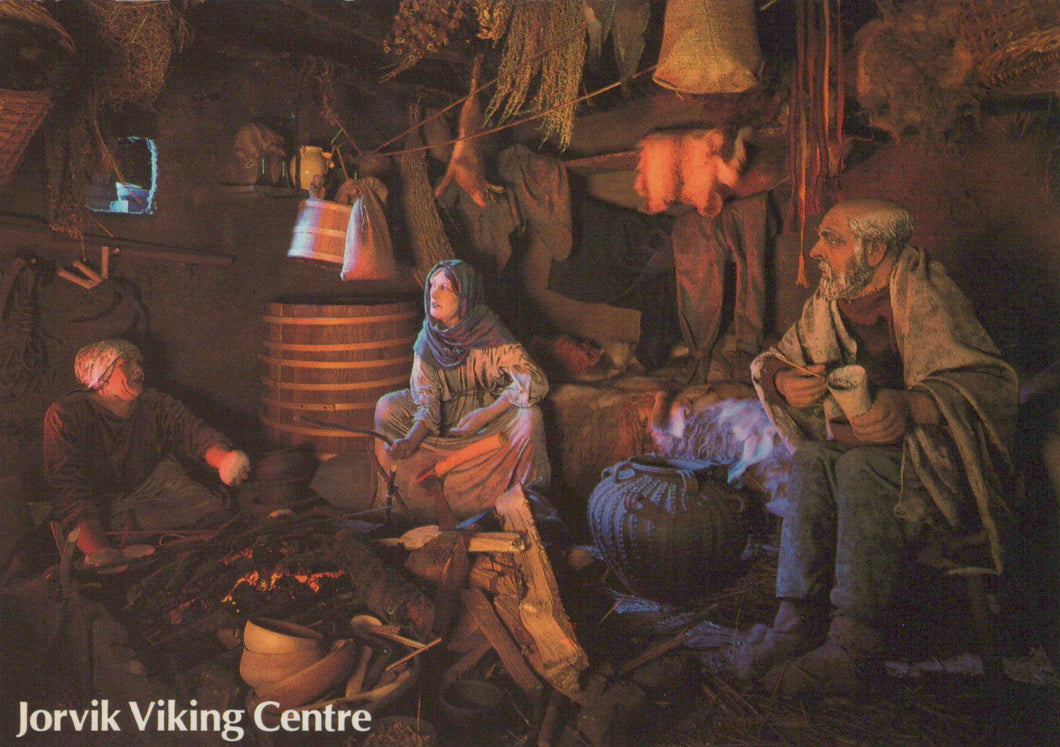 Viking-themed scene with people in a rustic setting, featuring the Jorvik Viking Centre logo.