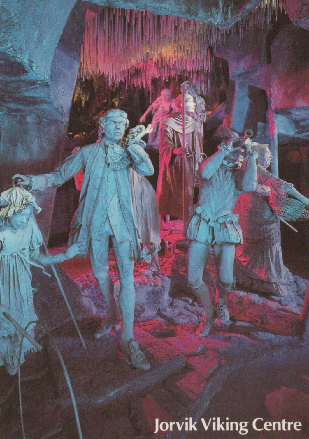 Illustration of people in a Viking-themed setting with text 'Jorvik Viking Centre'.