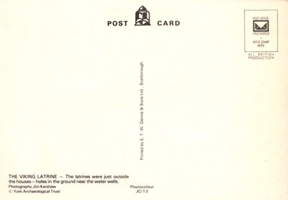 Back of a postcard with text and a logo, featuring a light beige background.