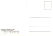 Load image into Gallery viewer, Back of a postcard with text and a small square image on a white background
