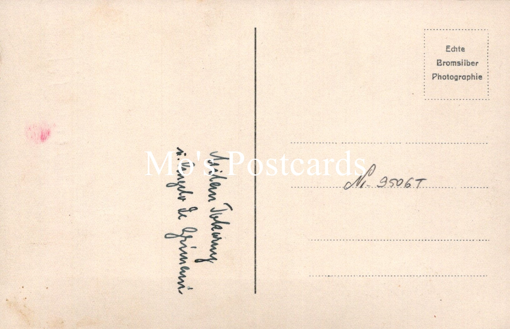 Vintage postcard back with text and a heart symbol