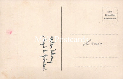Vintage postcard back with text and a heart symbol