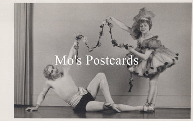 Vintage black and white photo of two dancers with 'Mo's Postcards' text overlay.