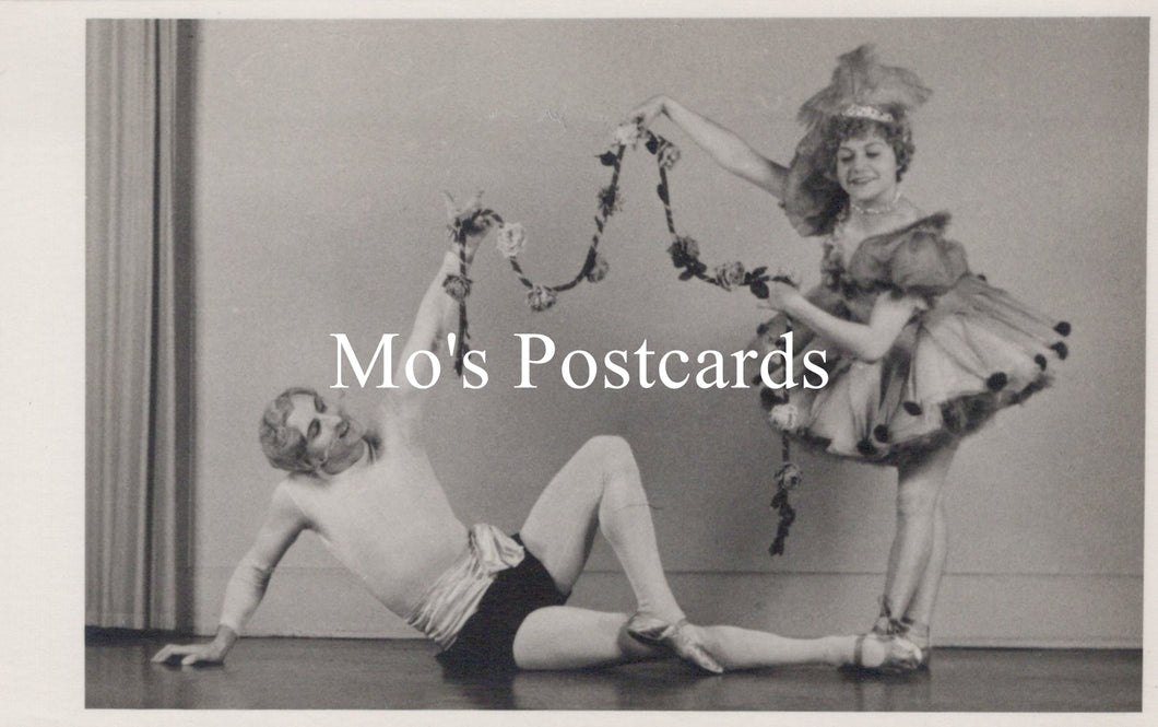 Vintage black and white photo of two dancers with 'Mo's Postcards' text overlay.