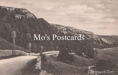 Vintage-style black and white photo of a mountainous landscape with 'Mo's Postcards' text overlay.