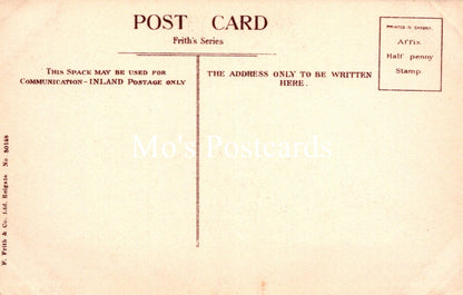 Vintage postcard with text and a stamp area on a beige background