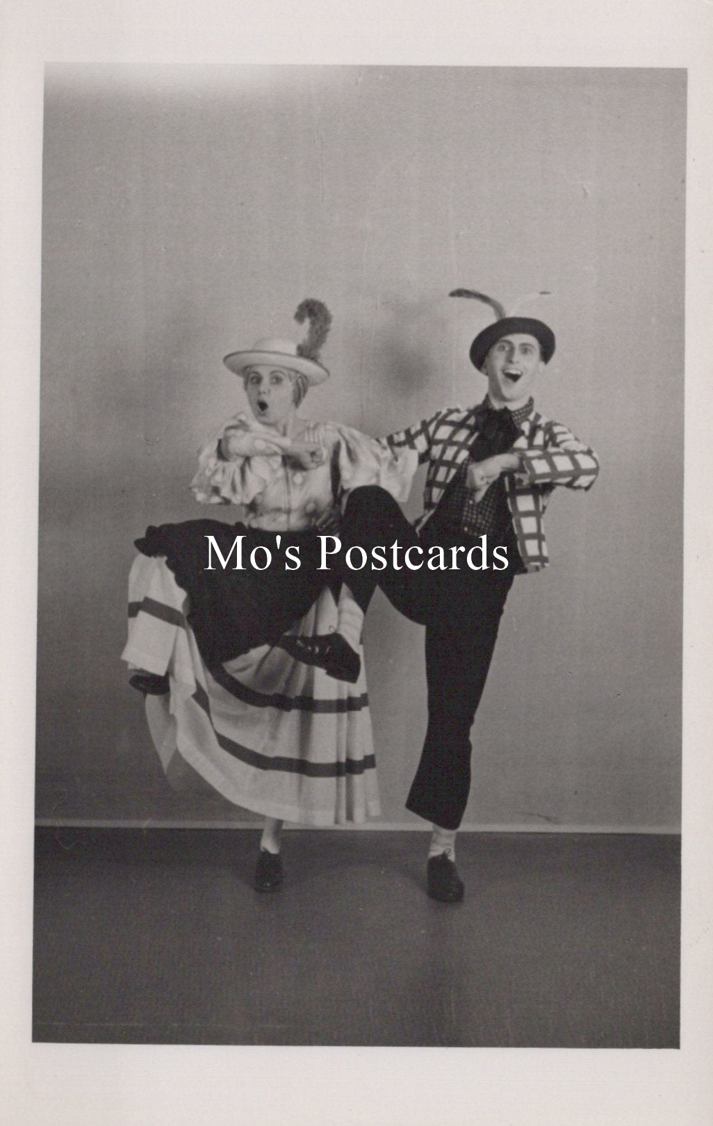 Two people in vintage costumes with 'Mo's Postcards' text overlay