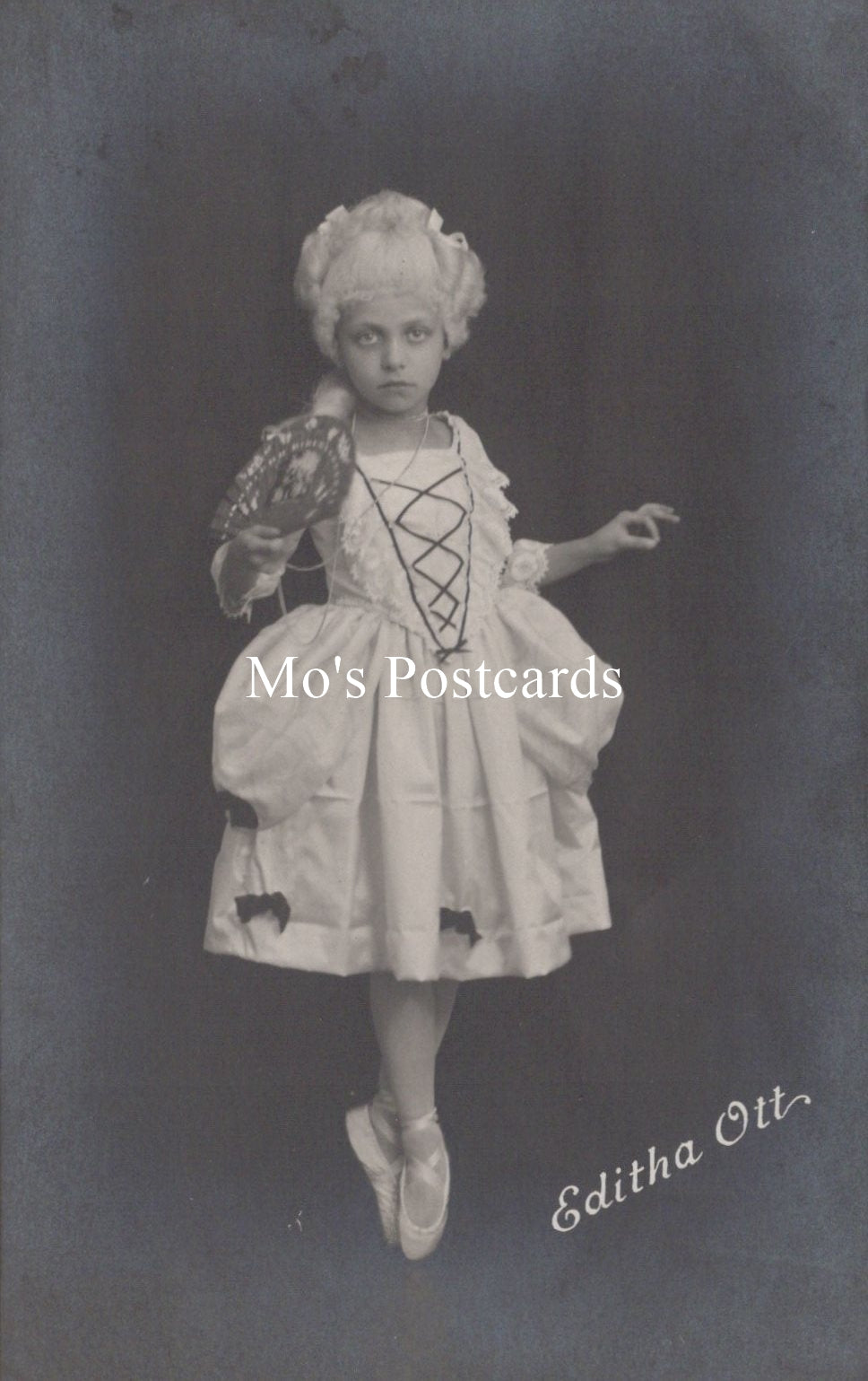 Vintage-style postcard with a dancer in costume and 'Mo's Postcards' text.